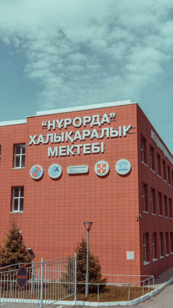 Exterior view of an international school building in Ust'-Kamenogorsk, Kazakhstan.